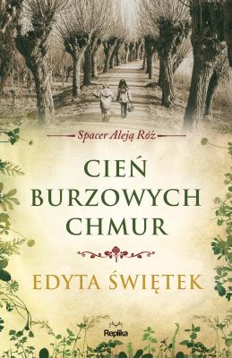 Cień burzowych chmur. Spacer Aleją Róż t. 1. Autor: Świętek Edyta, Orłowska Monika. SmakLiter.pl Okładka książki Cień burzowych chmur. Spacer Aleją Róż t. 1
