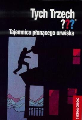 Tych Trzech??? Tajemnica Płonącego urwiska. Autor: Chandler Andy. SmakLiter.pl Okładka książki Tych Trzech??? Tajemnica Płonącego urwiska