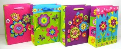 Opakowanie Torebka ozdobna 3D pionowa średnia / kwiatki 26X32X10/12 sztuk