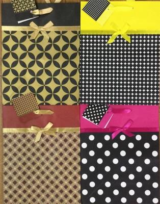 Opakowanie Torba lam.PL-6K  z kokardką op-12szt MIX / 26 x 32,4 x 12,7 /