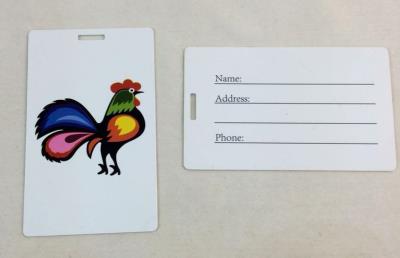 Opakowanie ETYKIENA NA WALIZKĘ KOGUT WHI