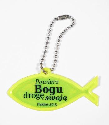 Zawieszka odblaskowa. Rybka - Powierz Bogu drogę... Wydawca: Koinonia. SmakLiter.pl Opakowanie Zawieszka odblaskowa. Rybka - Powierz Bogu drogę..