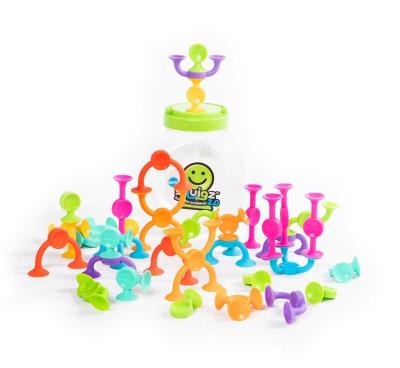 Klocki przyssawki Squigz 2.0 - 36 elem.. Wydawca: Fat brain toys Co. SmakLiter.pl Opakowanie Klocki przyssawki Squigz 2.0 - 36 elem.