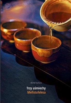 Trzy uśmiechy Mefistofelesa. Autor: Stachura Michał. SmakLiter.pl Okładka książki Trzy uśmiechy Mefistofelesa