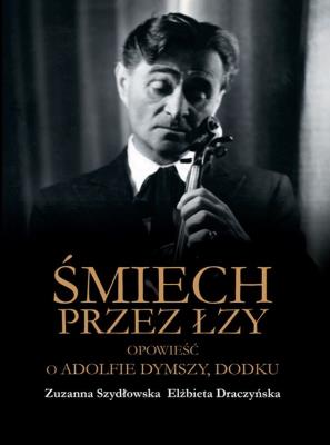 Śmiech przez łzy. Opowieść o Adolfie Dymszy, Dodku. Autor: Zuzanna Szydłowska, ZElżbieta Draczyńska. SmakLiter.pl Okładka książki Śmiech przez łzy. Opowieść o Adolfie Dymszy, Dodku