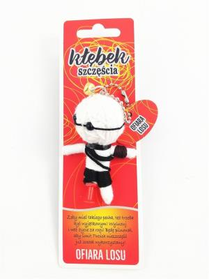 Brelok Kłębek Szczęścia - Ofiara losu. Wydawca: Jawi. SmakLiter.pl Opakowanie Brelok Kłębek Szczęścia - Ofiara losu