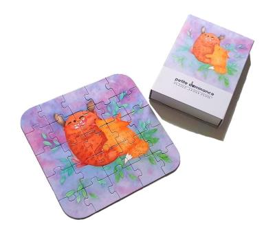 Puzzle 25 Leśny pupil. Wydawca: Petite dominance. SmakLiter.pl Opakowanie Puzzle 25 Leśny pupil