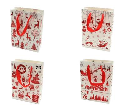 Torba prezentowa świąteczna 23,5x17,5x8 mix. Wydawca: OneDollar. SmakLiter.pl Opakowanie Torba prezentowa świąteczna 23,5x17,5x8 mix