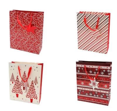 Torba prezentowa świąteczna 26x32x10 mix. Wydawca: OneDollar. SmakLiter.pl Opakowanie Torba prezentowa świąteczna 26x32x10 mix