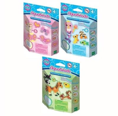 Aquabeads Mały zestaw kreatywny. Wydawca: Epoch. SmakLiter.pl Opakowanie Aquabeads Mały zestaw kreatywny