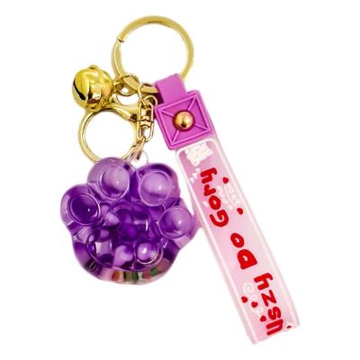 Opakowanie Brelok łapka. Fioletowy