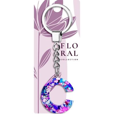 Opakowanie Brelok Literka Czarująca