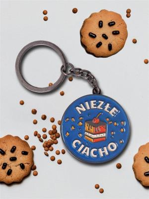 Brelok niezłe ciacho. Wydawca: Nadwyraz. SmakLiter.pl Opakowanie Brelok niezłe ciacho