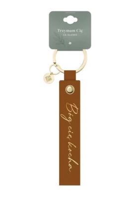 Brelok skórzany pasek - Bóg cię kocha. Wydawca: Szaron. SmakLiter.pl Opakowanie Brelok skórzany pasek - Bóg cię kocha