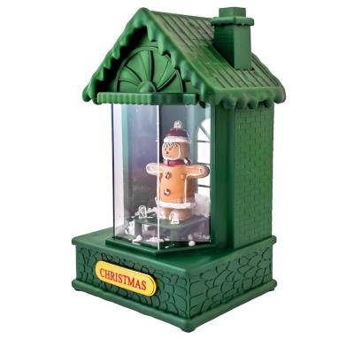 Opakowanie Domek led z muzyką i śniegiem zielony