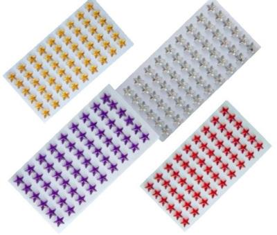 Dżety samoprzylepne gwiazdki srebrne 10mm 54szt. Wydawca: Brewis. SmakLiter.pl Opakowanie Dżety samoprzylepne gwiazdki srebrne 10mm 54szt