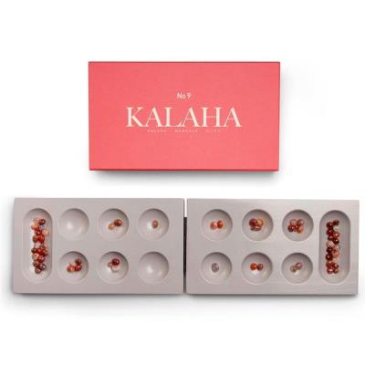 Gra planszowa Classic Kalaha. Wydawca: Most Wanted Gifts. SmakLiter.pl Opakowanie Gra planszowa Classic Kalaha