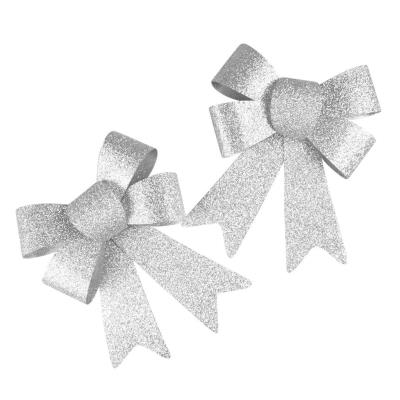 Opakowanie Kokardy brokatowe srebrne 2szt