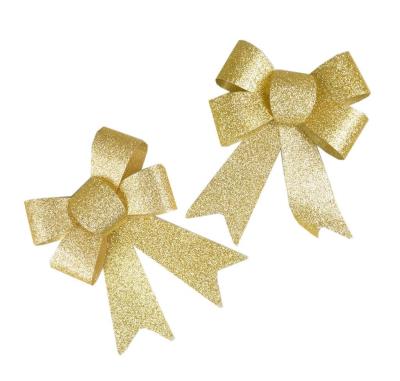 Opakowanie Kokardy brokatowe złote 2szt