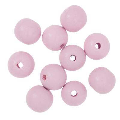 Koraliki drewniane kulki 2,5cm liliowe 10szt. Wydawca: Dalprint. SmakLiter.pl Opakowanie Koraliki drewniane kulki 2,5cm liliowe 10szt
