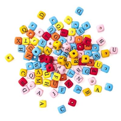 Opakowanie Koraliki drewniane litery 100szt