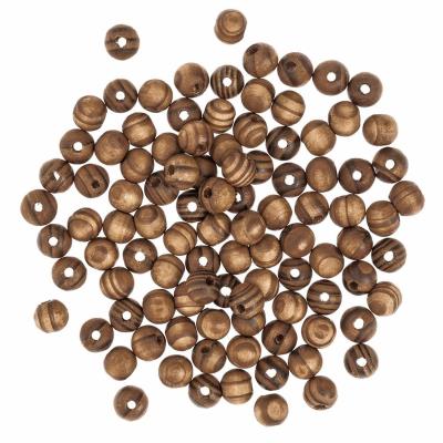 Opakowanie Koraliki drewniane sosnowe 10mm 100szt