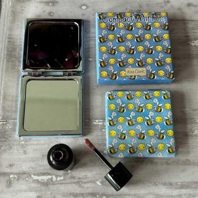 Lusterko w pudełku Słoneczne pszczoły. Wydawca: Alex Clark. SmakLiter.pl Opakowanie Lusterko w pudełku Słoneczne pszczoły