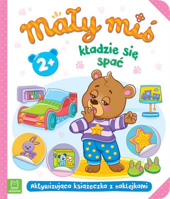 Okładka książki Mały miś kładzie się spać. Aktywizująca książeczka z naklejkami 2+