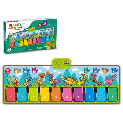 Mata muzyczna pianinko dinozaury. Wydawca: Trifox. SmakLiter.pl Opakowanie Mata muzyczna pianinko dinozaury