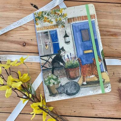 Opakowanie Notatnik z gumką A5 LCN05 Koty przed domem