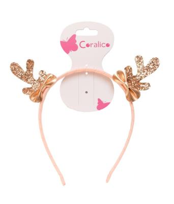 Opaska z rogami renifera. Wydawca: Coralico. SmakLiter.pl Opakowanie Opaska z rogami renifera