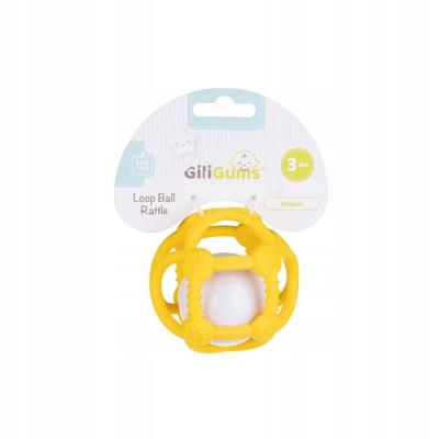 Opakowanie Piłka grzechotka żółta