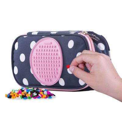 Opakowanie Piórnik szkolny na suwak Kropki z różowym panelem