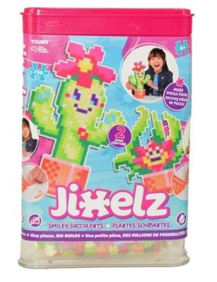 Puzzle 750 Pixelki Jixelz Uśmiechnięte kaktusy. Wydawca: Fat Brain Toy Co. SmakLiter.pl Opakowanie Puzzle 750 Pixelki Jixelz Uśmiechnięte kaktusy