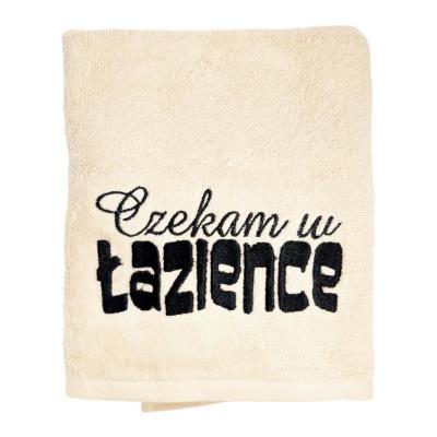 Opakowanie Ręcznik beżowy. Czekam w łazience