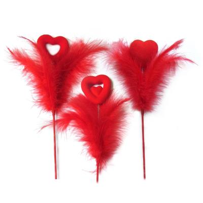 Opakowanie Serduszko z piórami na piku