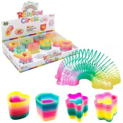 Zdjęcie produktu Sprężyna tęczowa transparentna kształty MIX