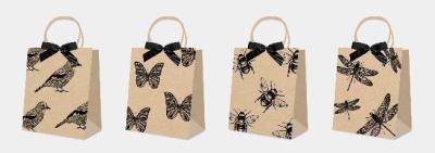 Torba prezentowa kraft 28x28cm z kokardą mix. Wydawca: incood.. SmakLiter.pl Opakowanie Torba prezentowa kraft 28x28cm z kokardą mix