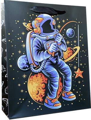 Opakowanie Torebki ozdobne A4 wzór dziecięcy  - Kosmonauta 12 sztuk mix