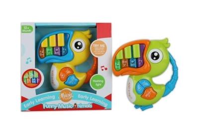 Opakowanie Zabawka muzyczna Tukan z pianinkiem