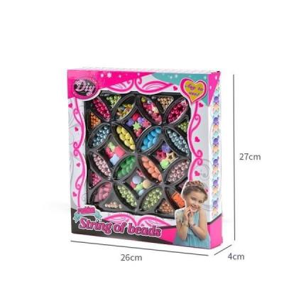 Zestaw koralików do tworzenia biżuterii. Wydawca: Rastar. SmakLiter.pl Opakowanie Zestaw koralików do tworzenia biżuterii