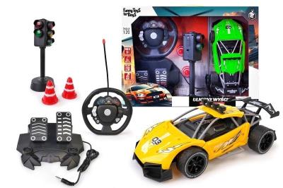 Auto R/C z kierownicą i pedałami mix. Wydawca: Artyk. SmakLiter.pl Opakowanie Auto R/C z kierownicą i pedałami mix