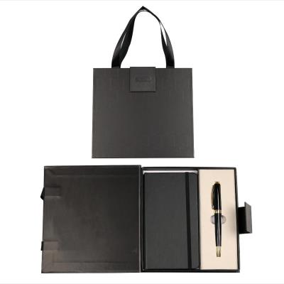 Długopis + notes Symphony premium czarno-złoty. Wydawca: CRESCO. SmakLiter.pl Opakowanie Długopis + notes Symphony premium czarno-złoty