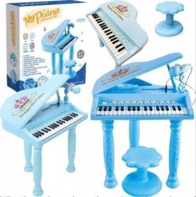 Opakowanie Fortepian elektroniczny z mikrofonem i krzesełkiem