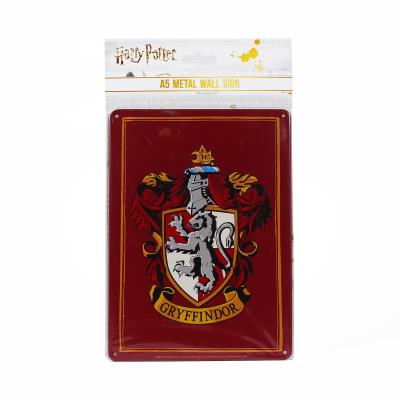 Harry Potter Tabliczka metalowa Herb Gryffindoru. Wydawca: Half Moon Bay. SmakLiter.pl Opakowanie Harry Potter Tabliczka metalowa Herb Gryffindoru