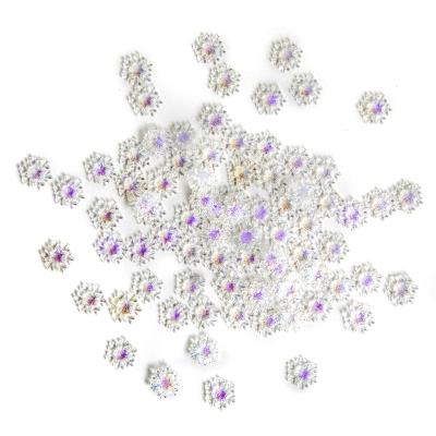 Opakowanie Konfetti śnieżynki opalizujące 9mm błękitne 80szt