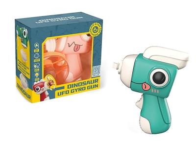 Pistolet Dino z bączkiem. Wydawca: Artyk. SmakLiter.pl Opakowanie Pistolet Dino z bączkiem