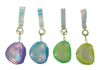 Opakowanie Portmonetka 2w1 brelok z wirującym piaskiem MIX