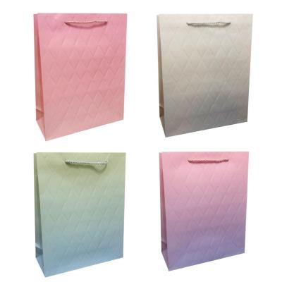 Torebka prezentowa S Gradient z tłoczeniem mix. Wydawca: JU-PITER. SmakLiter.pl Opakowanie Torebka prezentowa S Gradient z tłoczeniem mix