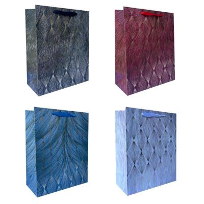 Torebka prezentowa uniwersalna L z metalizą mix. Wydawca: JU-PITER. SmakLiter.pl Opakowanie Torebka prezentowa uniwersalna L z metalizą mix